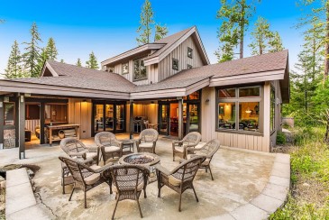 Stunning retreat with 3 suites, hot tub, extra lot, & EV charger
